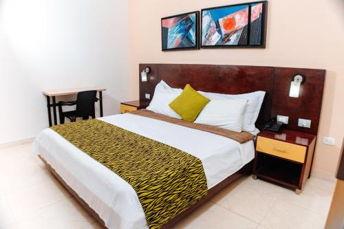 Hotel Luxor Cúcutaにあるベッド