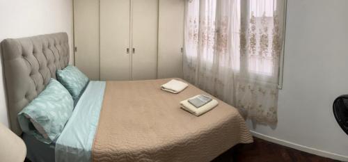 Кровать или кровати в номере Departamento Centro Plaza 9 Julio