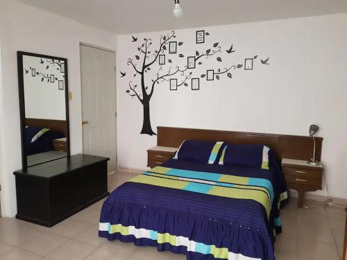 Ein Bett oder Betten in einem Zimmer der Unterkunft Qosqo Plaza Retreat Zaguan del Cielo