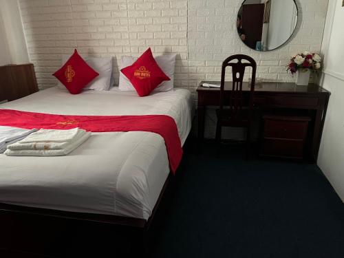 Giường trong phòng chung tại Xumi Motel Linh Đàm
