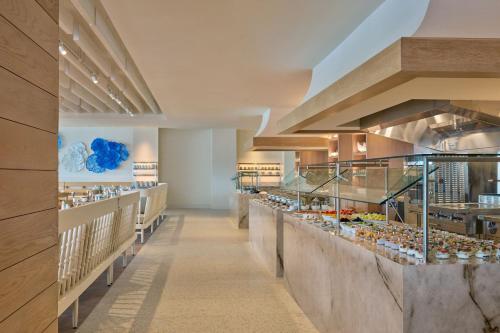 a bakery with a long aisle with food at The Westin St Thomas Beach Resort & Spa in Frydendal