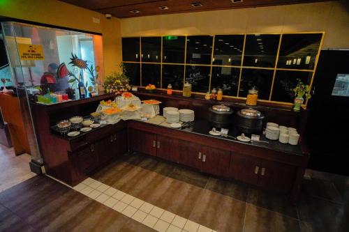 an overhead view of a buffet in a restaurant at Hotel Olive Eva in Kakkanad