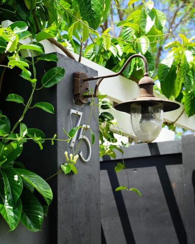a light on the side of a fence at Edward Lodge New Fam in Brisbane