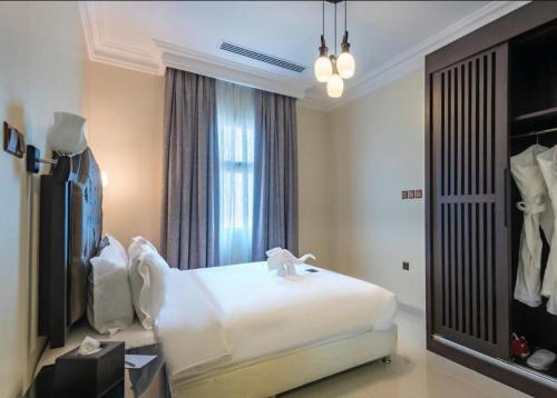 Postel nebo postele na pokoji v ubytování Dibba Sea View Hotel by AMA Pro