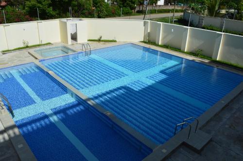 a large swimming pool on top of a building at HOTEL TIFFANY in Mombasa