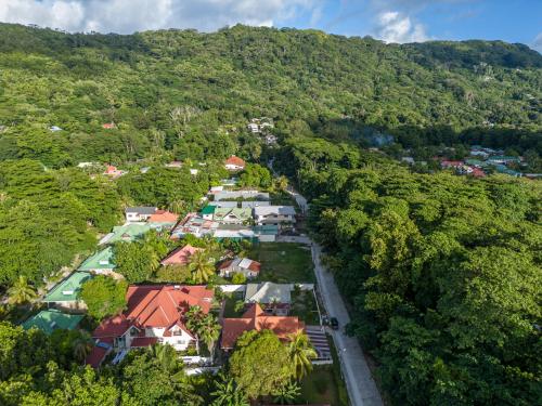 an aerial view of a village in a forest at Villa Authentique in La Digue