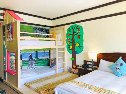Katil atau katil-katil dalam bilik di Yoho Beach Resort Kenting