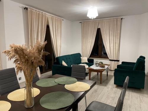Posezení v ubytování Pogodna Zagroda-Dom na Kaszubach & Strefa Spa