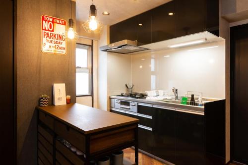 Una cocina o zona de cocina en Stay Hakata