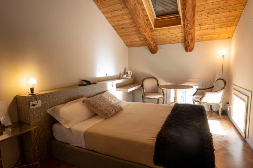 Ein Bett oder Betten in einem Zimmer der Unterkunft Le Andrianelle