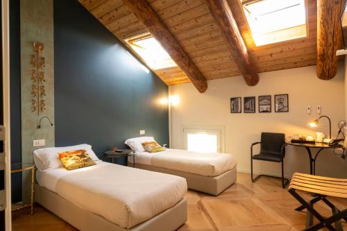 Ein Bett oder Betten in einem Zimmer der Unterkunft Le Andrianelle