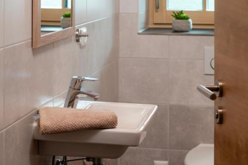 Koupelna v ubytování Traumferienwohnung Alpenliebe Sommer-Hörnerbahnen kostenlos