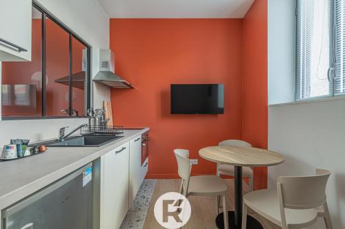 Η κουζίνα ή μικρή κουζίνα στο R'Apparts Le Palazzo