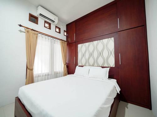 Кровать или кровати в номере PLATFORM_Villas Nusa Dua Villa 8