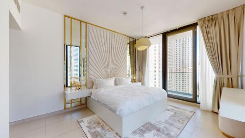 Postel nebo postele na pokoji v ubytování Primestay - LIV Residences 1BR, Dubai Marina