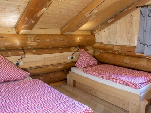 Katil atau katil-katil dalam bilik di Blockhaus Almhütte Wiesenglück