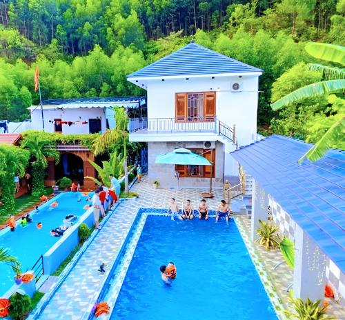 an overhead view of a pool at a resort at The Hill Villas in Phong Nha
