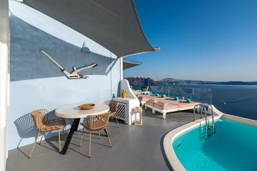 Πισίνα στο ή κοντά στο Kima Oia Suites
