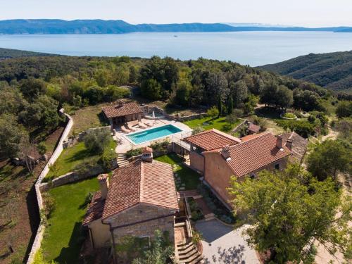 Villa Malini with Pool, Sauna and Fenced Garden