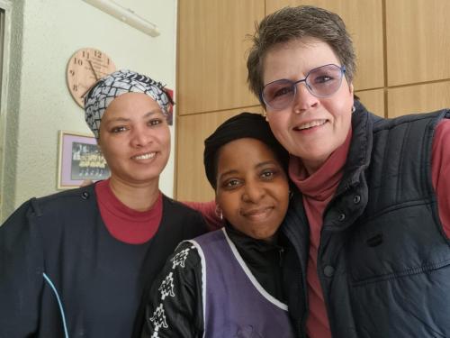 a woman and two women posing for a picture at Old Oak Guest House in Bellville