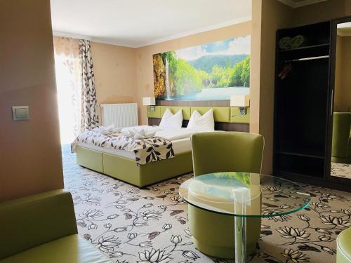 Posteľ alebo postele v izbe v ubytovaní Hotel Pruggererhof
