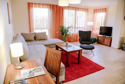 Ferienpark Templin direkt neben der Naturthermeにあるテレビまたはエンターテインメントセンター