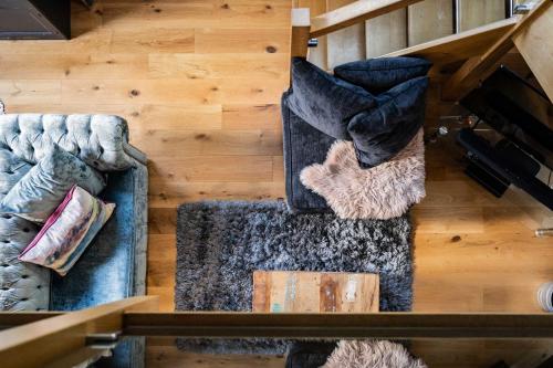 an overhead view of a living room with a couch at Host & Stay - The Chapel in Thornham in Thornham
