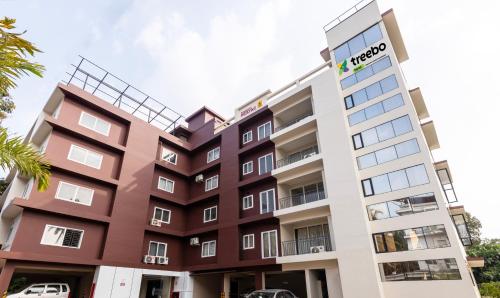 a rendering of the exterior of a building at Treebo Trend Sreepathi Prayag Apartments in Guruvāyūr