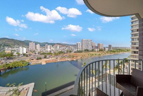 a view of a river from a balcony at Waikiki Beach Golden Holiday in Honolulu