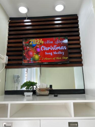 a sign for a new star christmas song melody on a mirror at Brenthill Baguio condo unit near SM baguio in Baguio