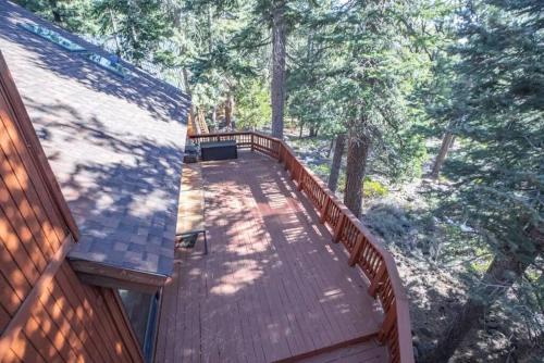 an aerial view of a deck on a house at Luna Cabin - 5BR Hot Tub A/C Game Room EV Charger in Tahoe Vista