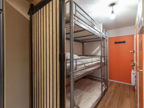 a bunk bed room with two bunk beds at Appartement La Mongie, 1 pièce, 4 personnes - FR-1-404-348 in Bagnères-de-Bigorre