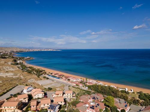 an aerial view of a beach and the ocean at Grenilù Sea in Crotone
