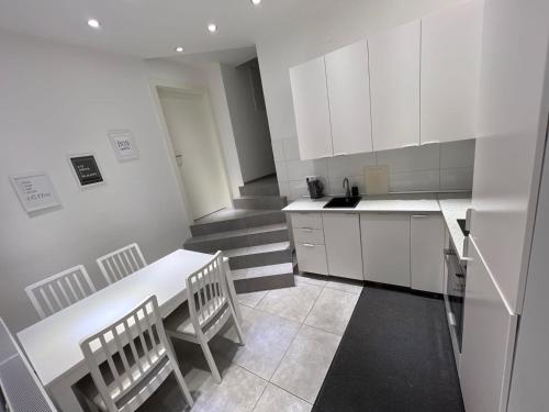 Kuchyň nebo kuchyňský kout v ubytování L8 Street - Leonbergerstraße 22