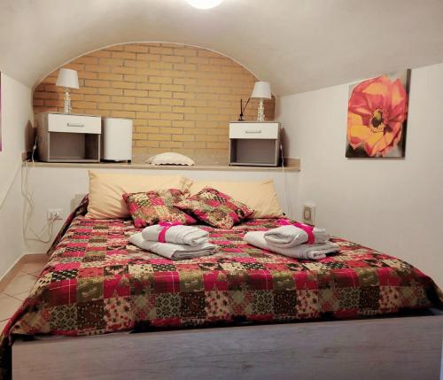 Postel nebo postele na pokoji v ubytování Sweet home Gaeta