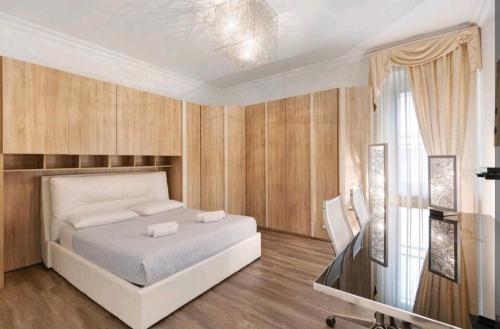 A bed or beds in a room at Residenza Tosca