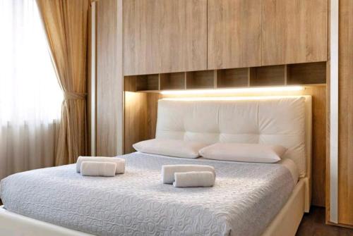 A bed or beds in a room at Residenza Tosca