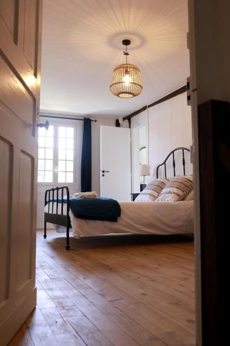 Кровать или кровати в номере Maison - Les Traversières