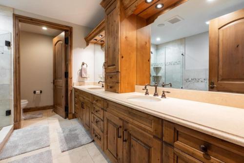 a bathroom with a sink and a shower and a toilet at Incredible 4BD Mtn Penthouse with Pool and Hot Tub, AC in Avon