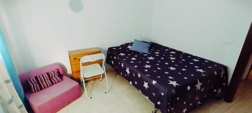 Katil atau katil-katil dalam bilik di Tenerife Homestay