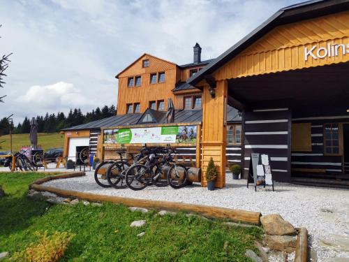 a group of bikes parked in front of a building at Apartmán Bára in Cerny Dul