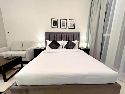 Postel nebo postele na pokoji v ubytování Cozy Studio in Dubai