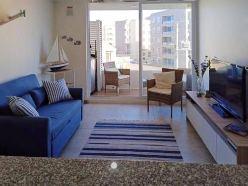 Posezení v ubytování Hermoso departamento a pasos del mar.