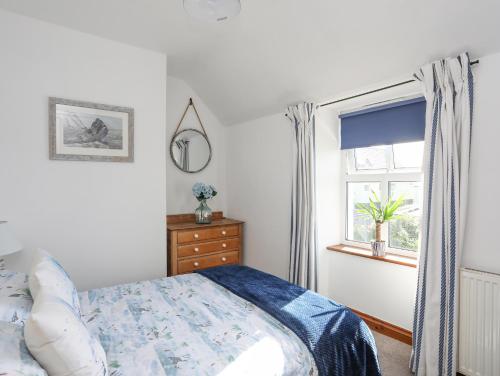 Ένα ή περισσότερα κρεβάτια σε δωμάτιο στο Bron Gadair