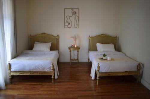 Cama o camas de una habitación en El Otel The Hotel