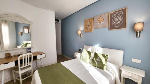 Letto o letti in una camera di Eco Hotel Toledo