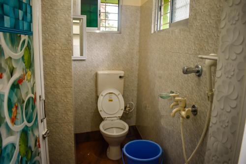 Ένα μπάνιο στο Green Palace Guest House