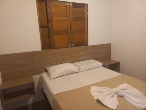 Postel nebo postele na pokoji v ubytování Flats da Ilha 2 Quartos