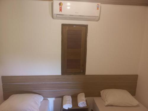 Postel nebo postele na pokoji v ubytování Flats da Ilha 2 Quartos