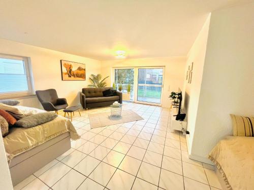 Χώρος καθιστικού στο Homely - modern - für 4 - Boxspringbetten - Internet